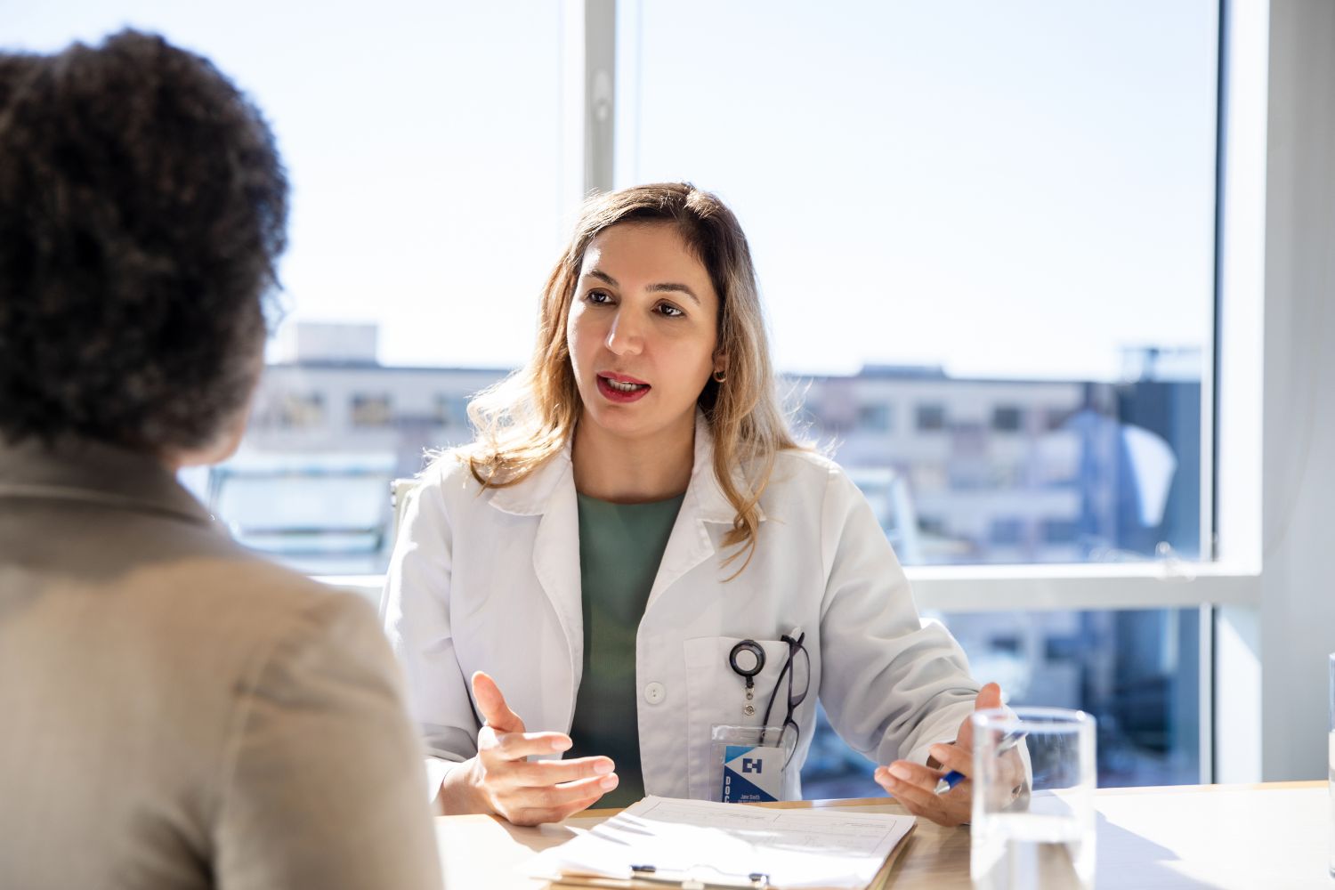 A patient discussing boosting melatonin with their oncologist.