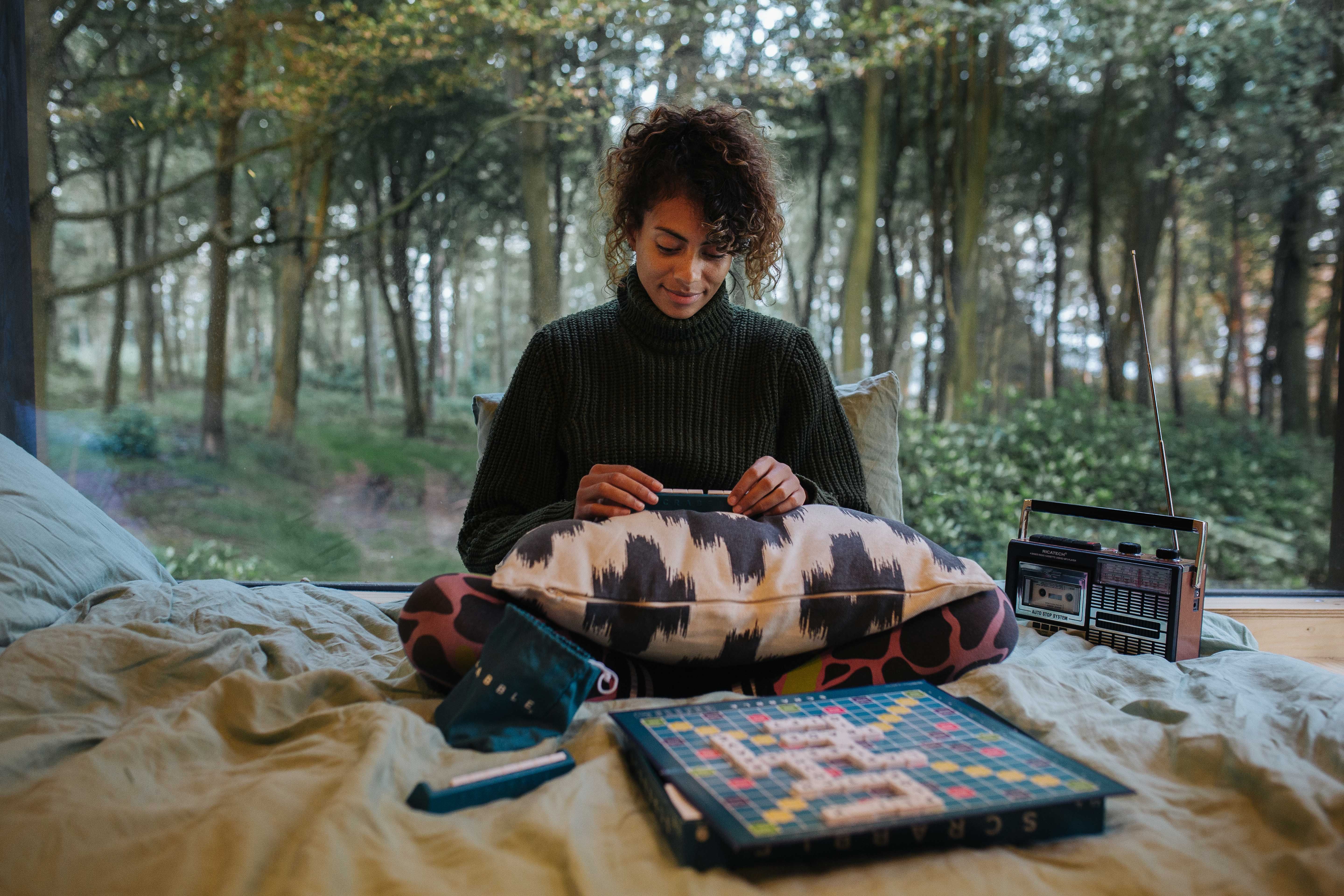 Playing scrabble at Unplugged Cabin Olive