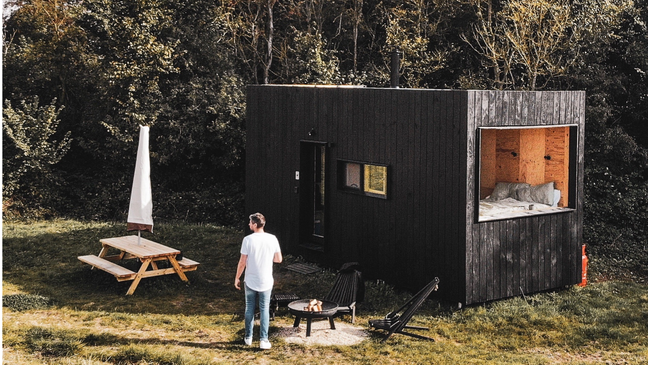 Lee outside Margo in the sunshine
