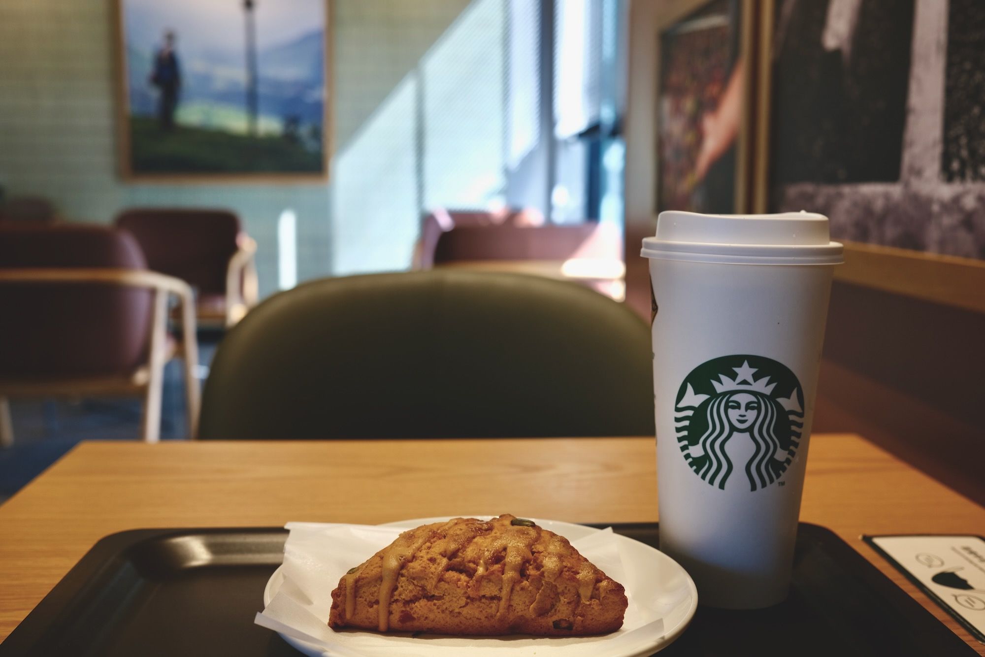 Coffee and a scone before cramming with homework for school. Fuji X100v